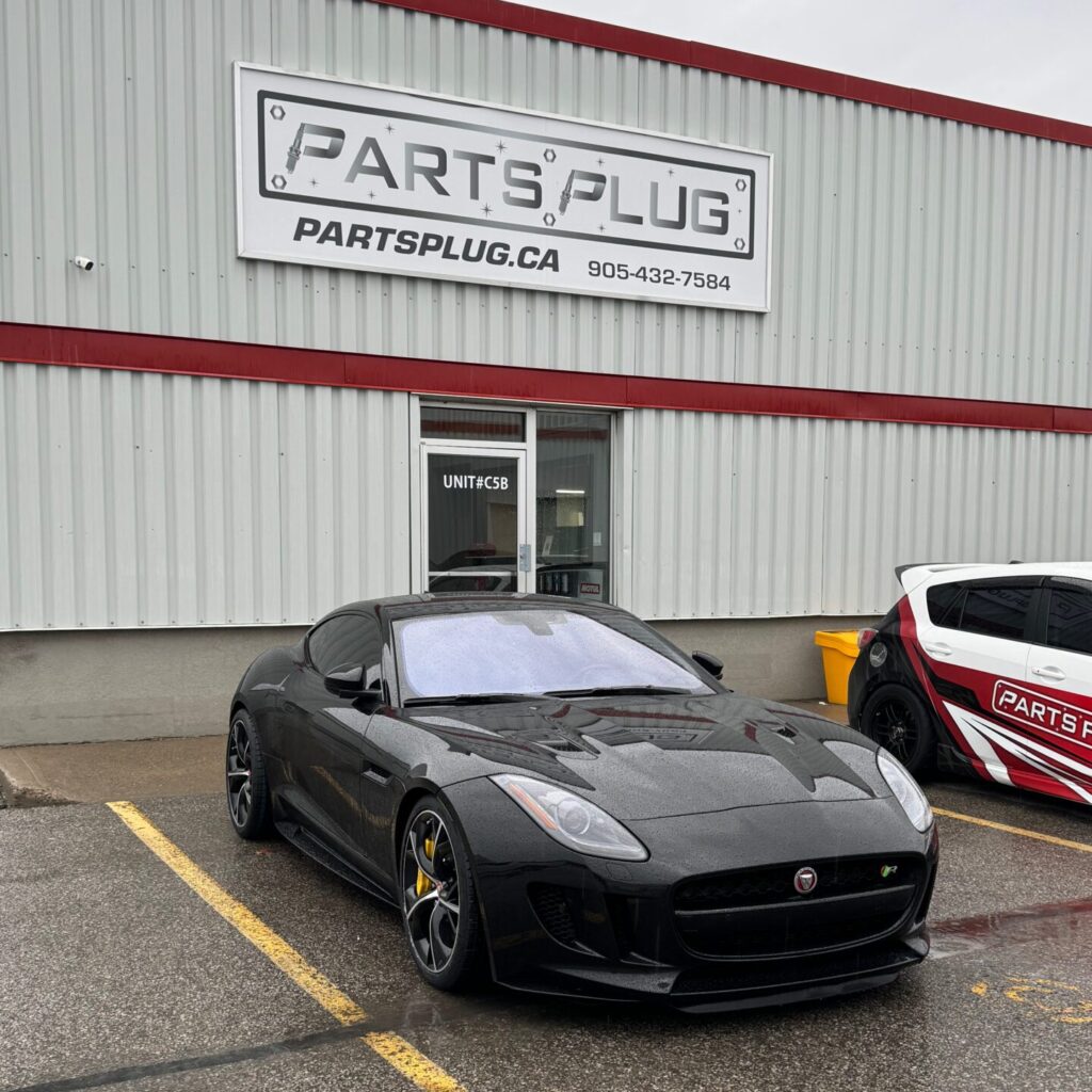 Black Jaguar F-Type Parked Outside The Parts Plug Shop
